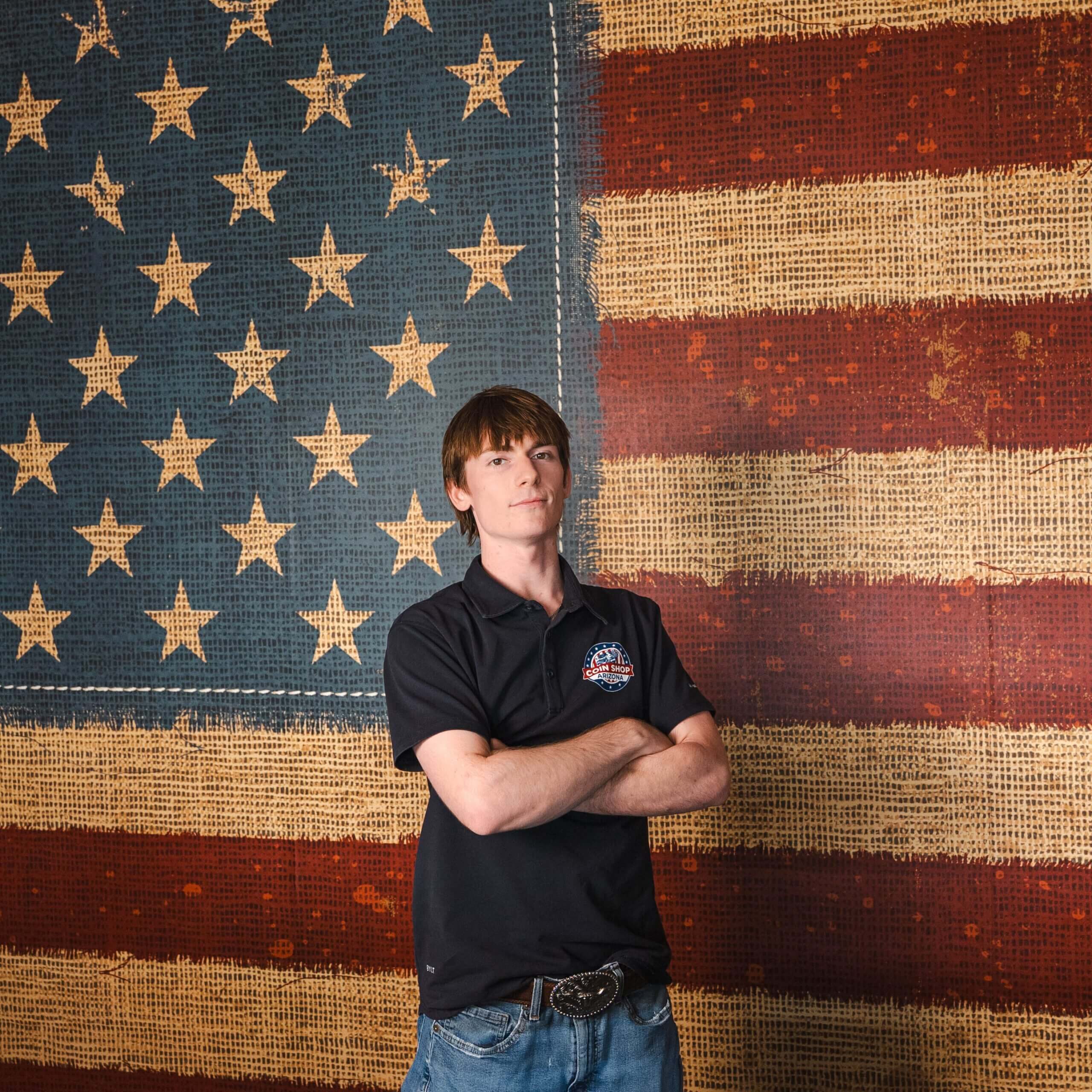 Young man posing with arms crossed